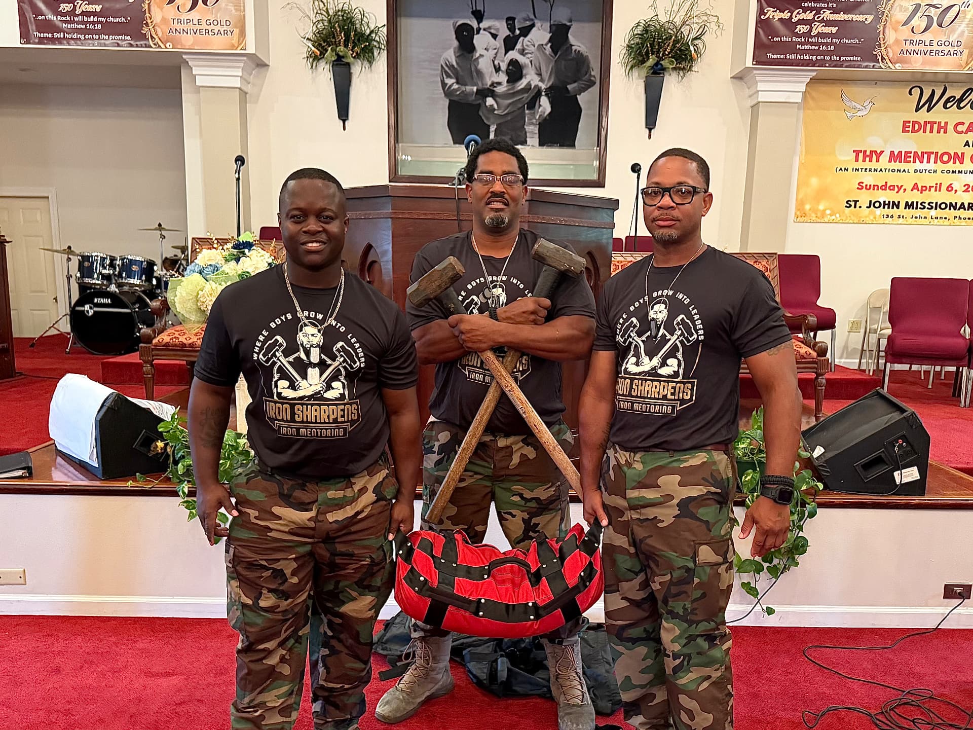 Three Iron Sharpens Iron mentors standing together at St. John Missionary Baptist Church